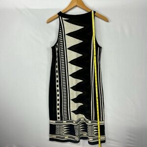 Beautiful designer no sleeve color block dress. Pristine.